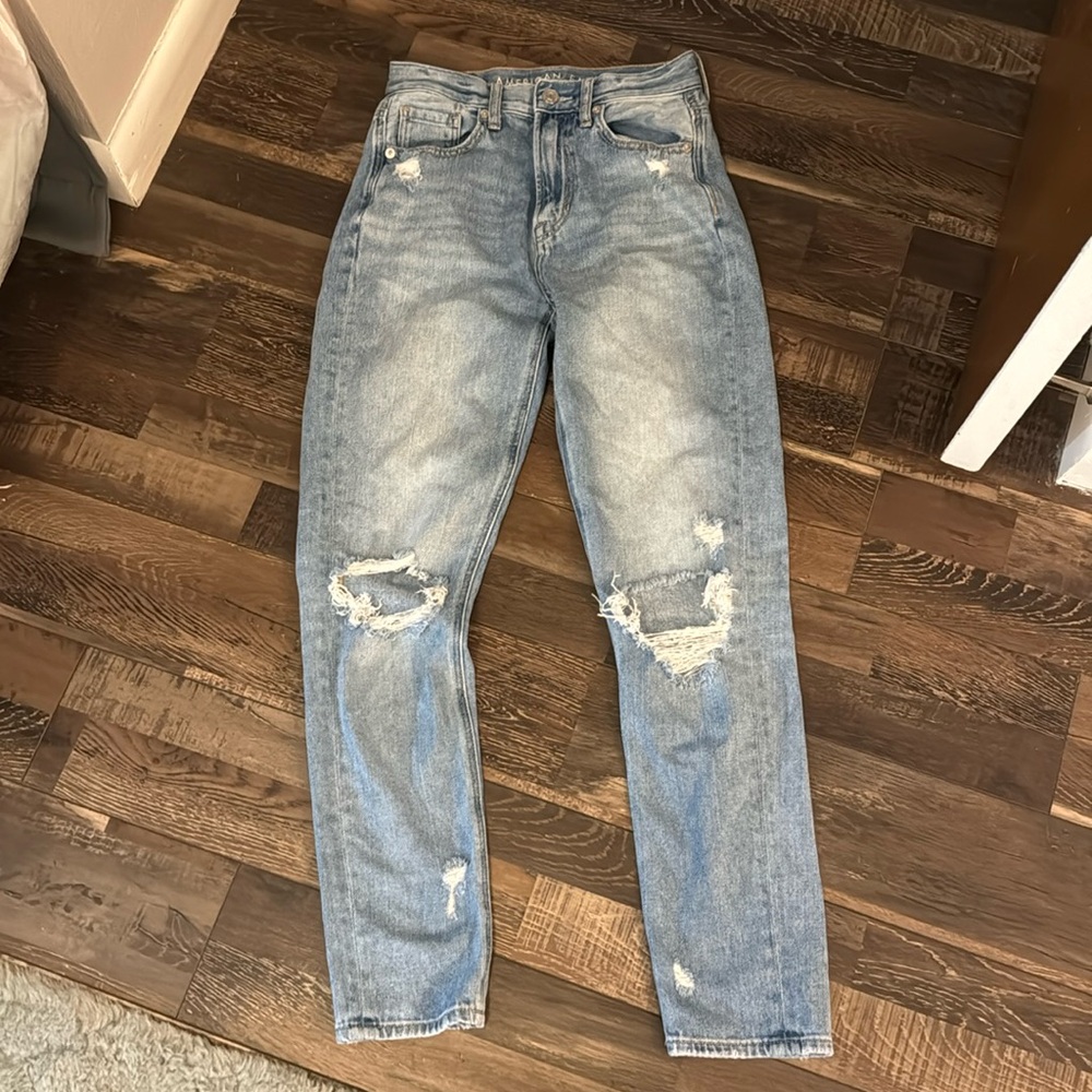 Used, like new.  American Eagle jeans.  Size 00.